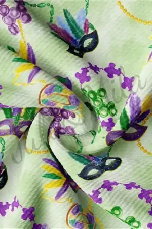 While Supplies Last Mardi Gras Printed Liverpool Bullet Textured Stretch Solid Strip Thick Knit Jersey Fabric